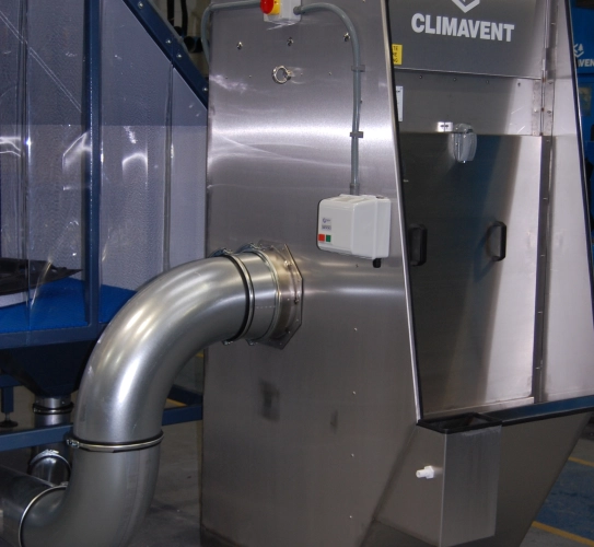 Stainless steel wet collector connected onto a down draught bench to be used for the extraction of highly explosive magnesium dust